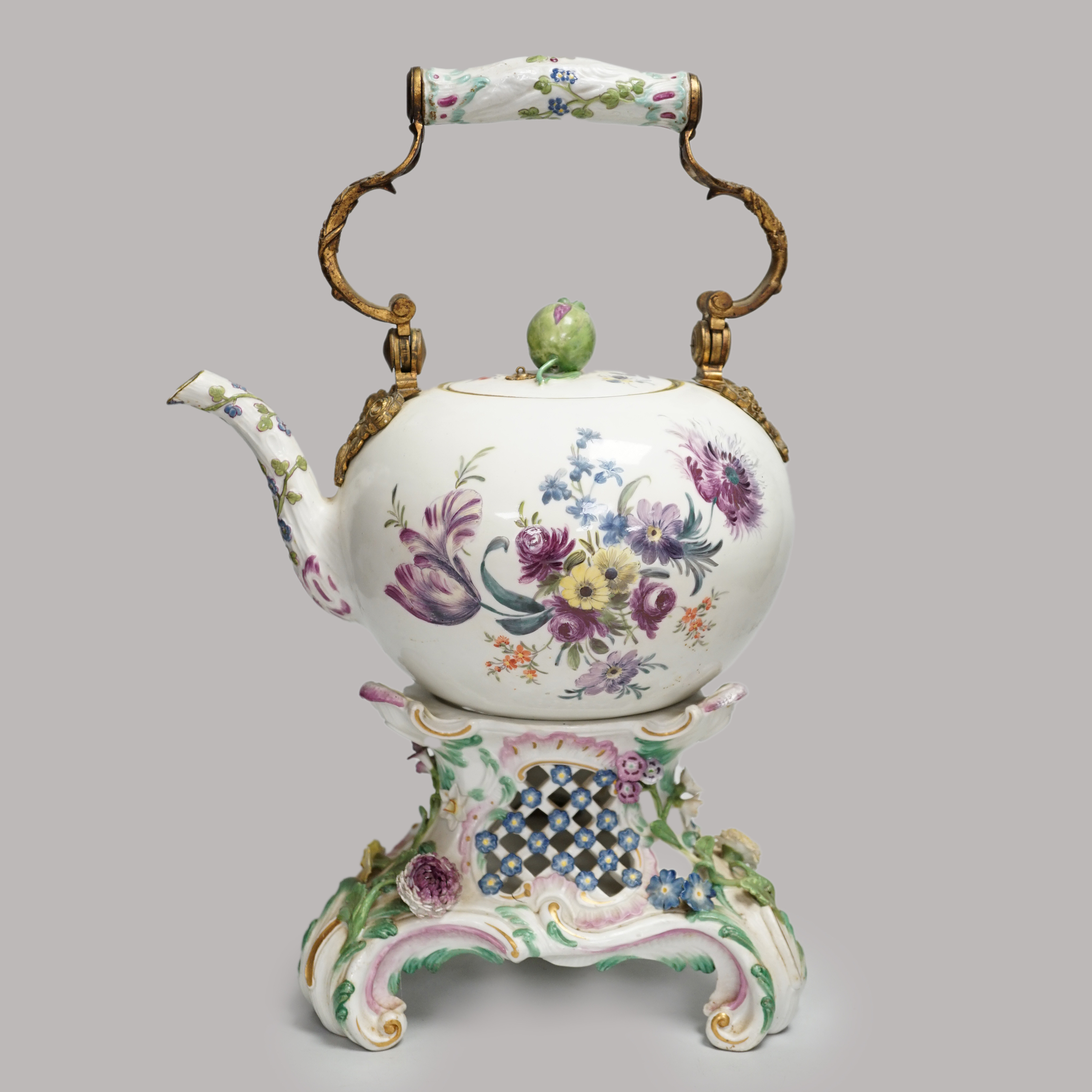 A mid 18th century Meissen teapot on a later Dresden stand with brass handle and floral decoration, height on stand 38cm